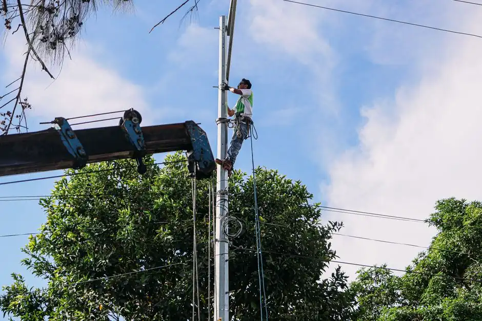 Utility technician performing gas line maintenance in the Historic District of Apex, NC